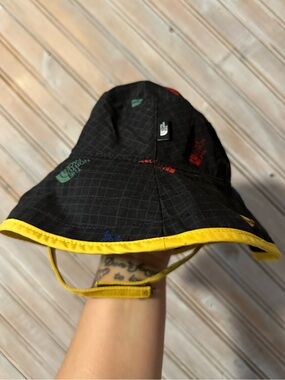 The North Face Kids Black Bucket Hat with Yellow Rim